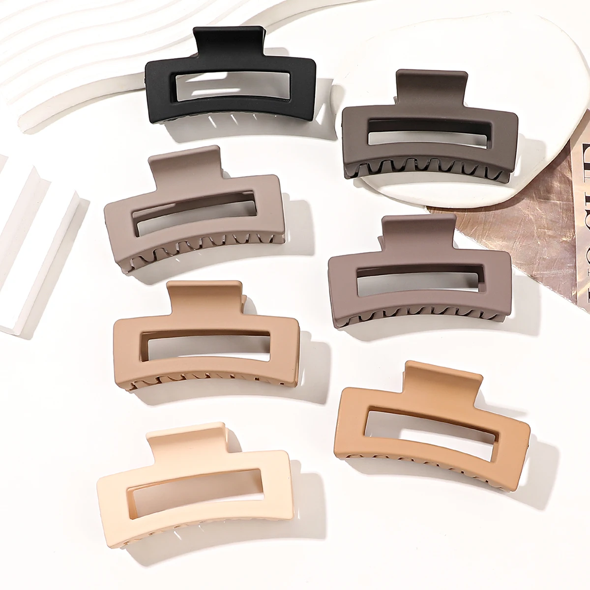 A selection of neutral matte hair claw clips